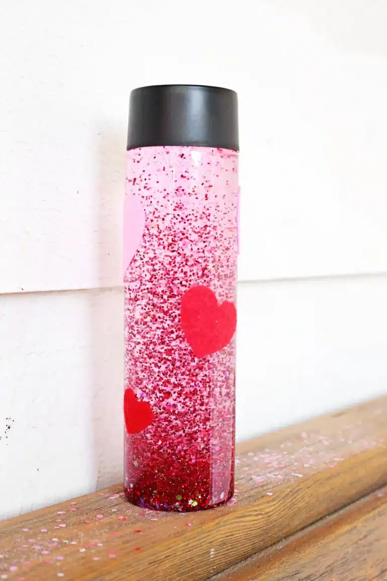 love potion valentine's sensory bottle with red glitter for valentine's day
