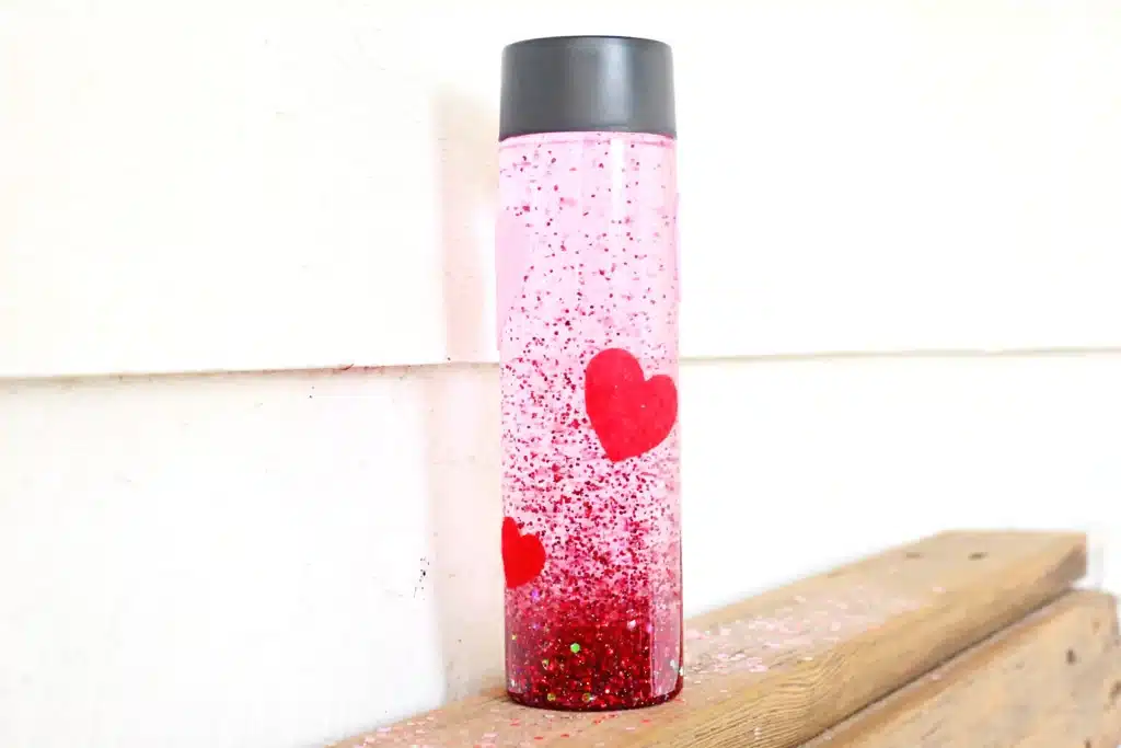 Love Potion Valentine Sensory Bottle - Cultivating Brilliant Minds love potion valentine's sensory bottle with red glitter for valentine's day