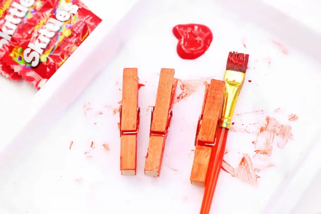 Valentine Candy Love Bugs - Cultivating Brilliant Minds clothespins painted red