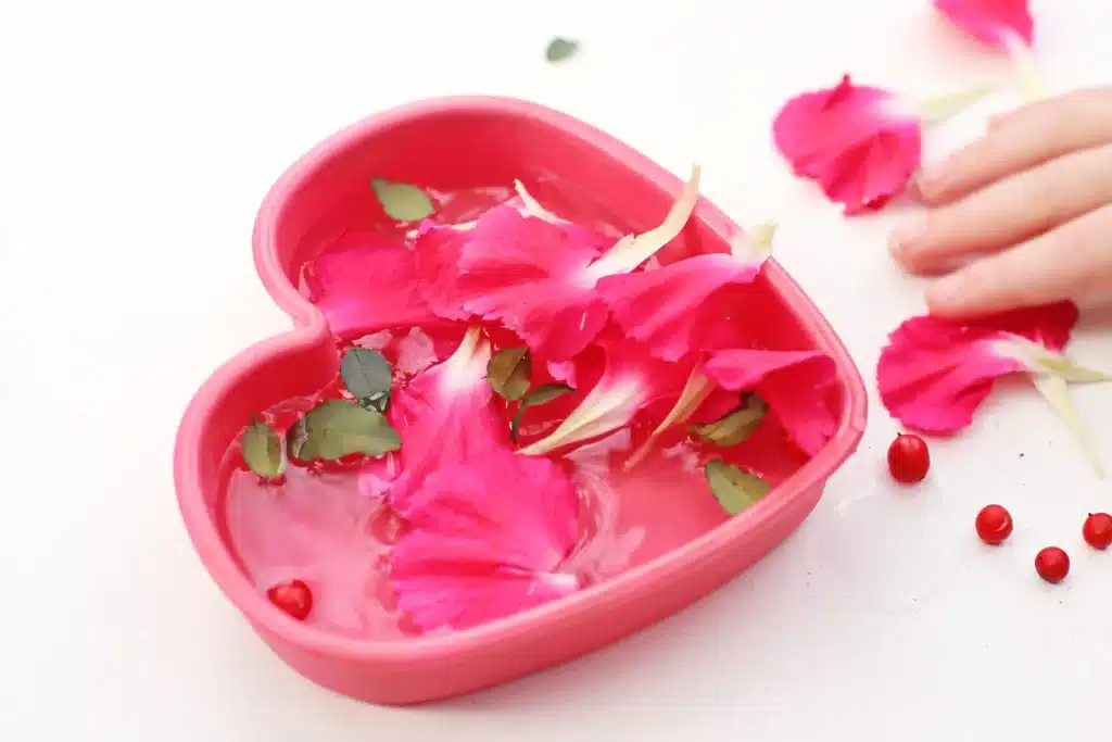 Ice Heart Suncatchers - Cultivating Brilliant Minds ice heart suncatcher made with leaves, petals, and betties