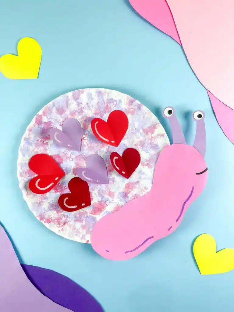 Valentine's Day Snail Craft - Cultivating Brilliant Minds paper plate snail craft with hearts for valentine's day