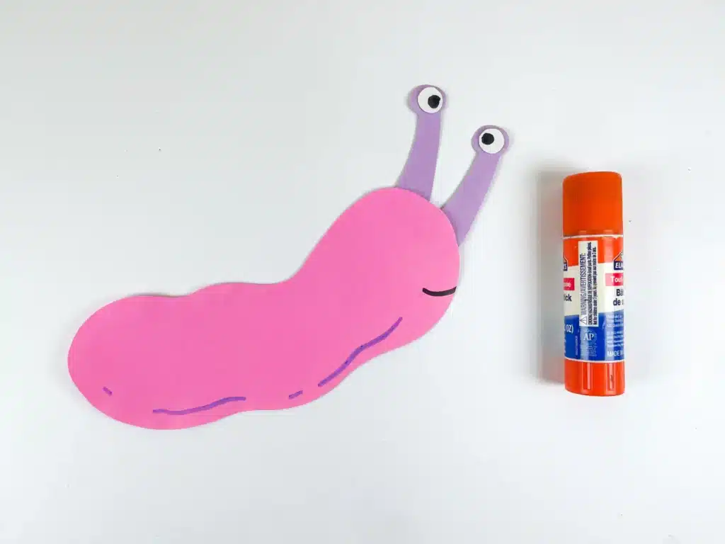 Valentine's Day Snail Craft - Cultivating Brilliant Minds pink and purple construction paper cut out to look like a snail