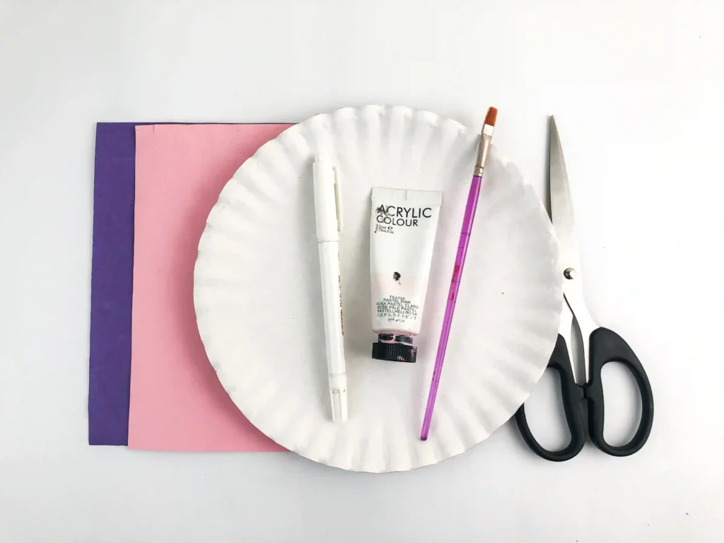 Valentine's Day Sheep Craft - Cultivating Brilliant Minds pink and purple construction paper, paper plate, pink paint, paint brush, glue, and scissors