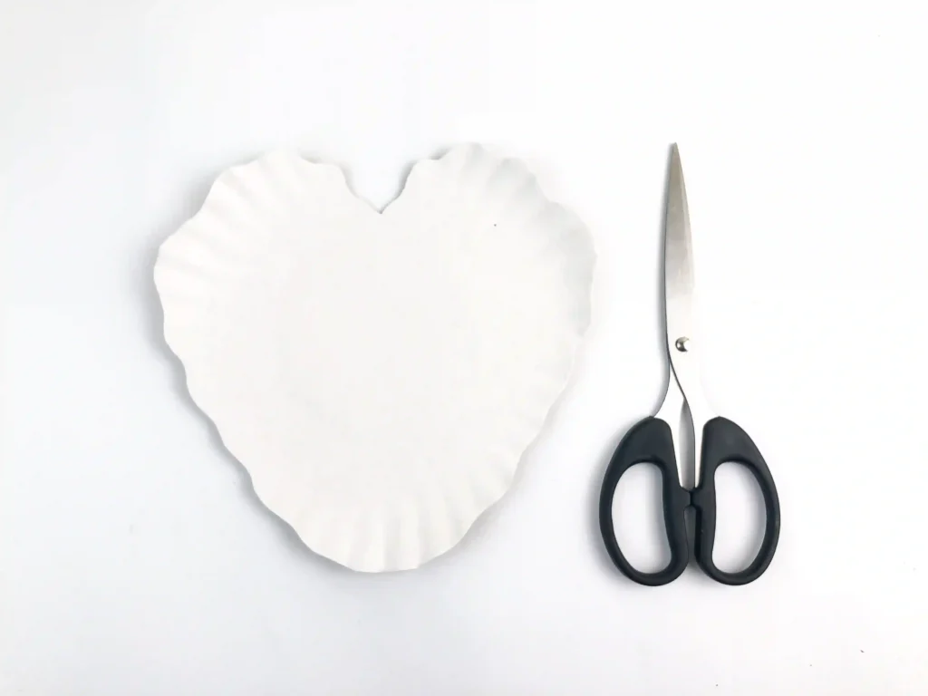 Valentine's Day Sheep Craft - Cultivating Brilliant Minds a paper plate cut into a heart