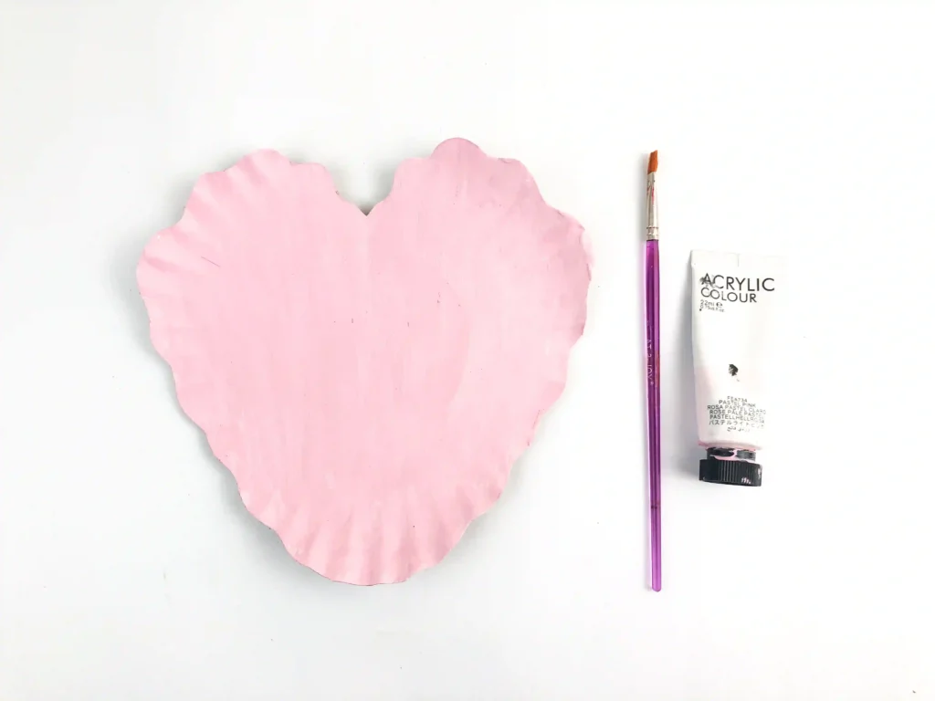 Valentine's Day Sheep Craft - Cultivating Brilliant Minds a paper plate cut into a heart and painted pink