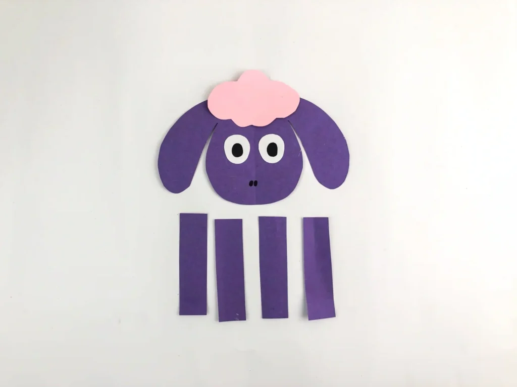 Valentine's Day Sheep Craft - Cultivating Brilliant Minds sheep head and legs cut out of construction paper