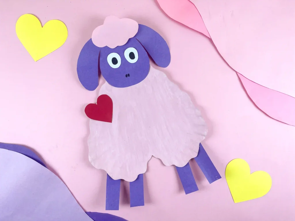 Valentine's Day Sheep Craft - Cultivating Brilliant Minds valentine's day craft for kids: a paper plate cut into a heart and construction paper cut to look like a sheep