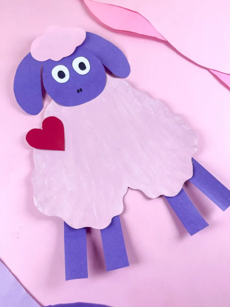Valentine's Day Sheep Craft - Cultivating Brilliant Minds valentine's day craft for kids: a paper plate cut into a heart and construction paper cut to look like a sheep