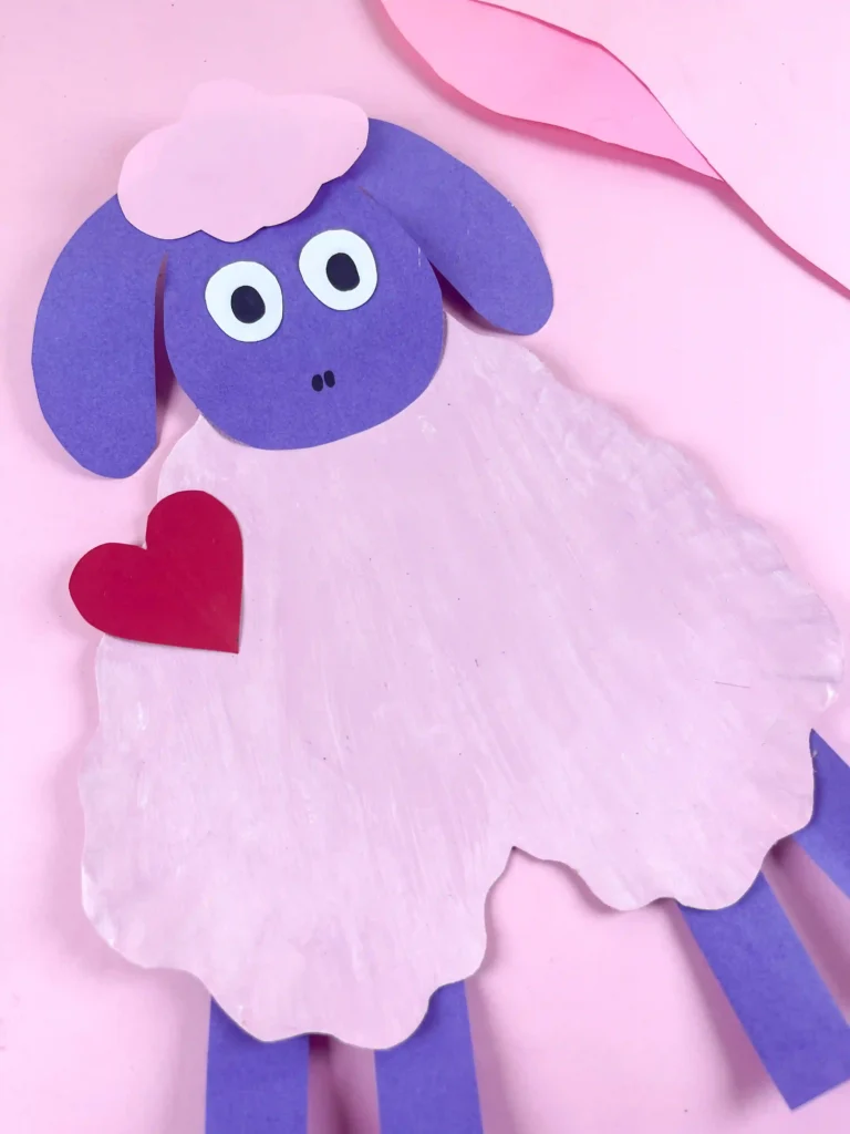 Valentine's Day Sheep Craft - Cultivating Brilliant Minds valentine's day craft for kids: a paper plate cut into a heart and construction paper cut to look like a sheep