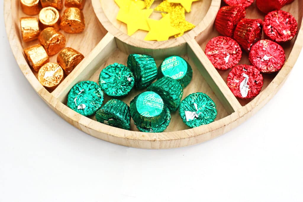 Candy Christmas Tree - Cultivating Brilliant Minds rolos, reeses candies, christmas hershey kisses and star stickers