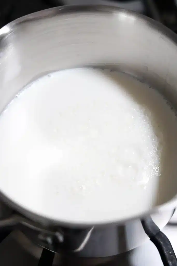 Strawberry White Hot Chocolate - Cultivating Brilliant Minds milk and melted white chocolate in a pot