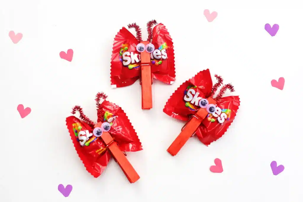 Valentine Candy Love Bugs - Cultivating Brilliant Minds valentine candy love bugs using a clothespins and snack bags of skittles