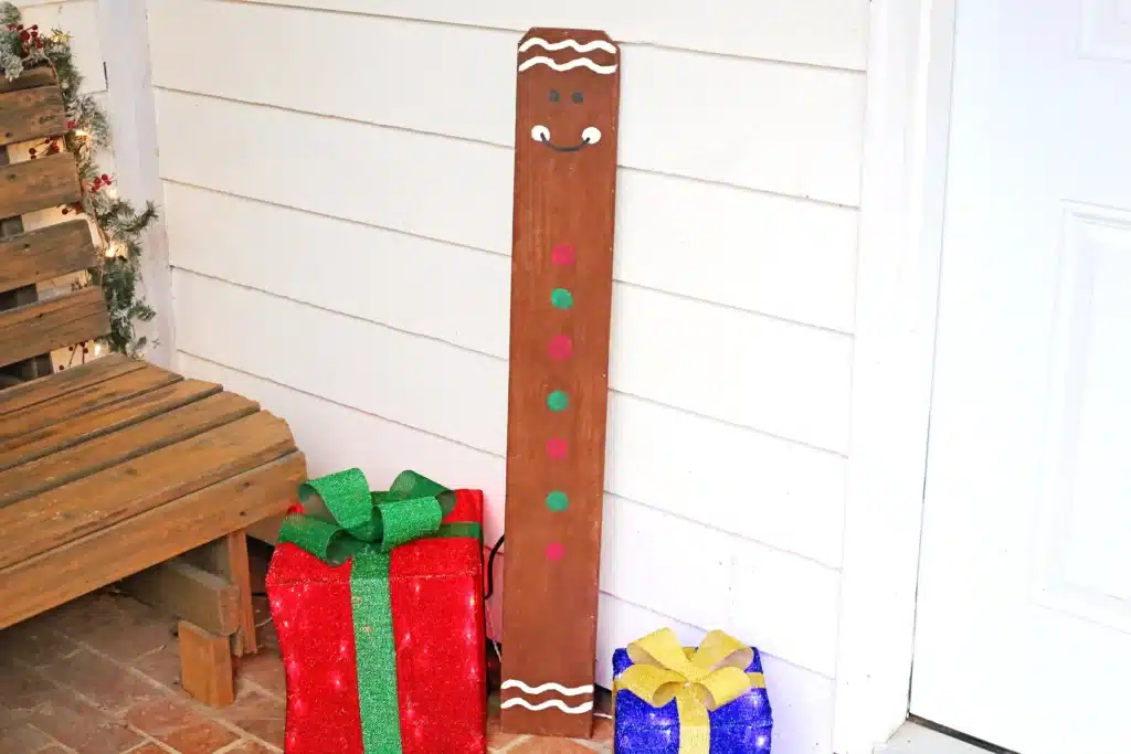 Wooden Gingerbread Keepsake Craft - Cultivating Brilliant Minds Wooden Gingerbread Keepsake Craft: a wooden board cut to the height of a child and painted to look like a gingerbread man