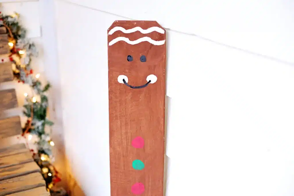 Wooden Gingerbread Keepsake Craft - Cultivating Brilliant Minds Wooden Gingerbread Keepsake Craft: a wooden board cut to the height of a child and painted to look like a gingerbread man