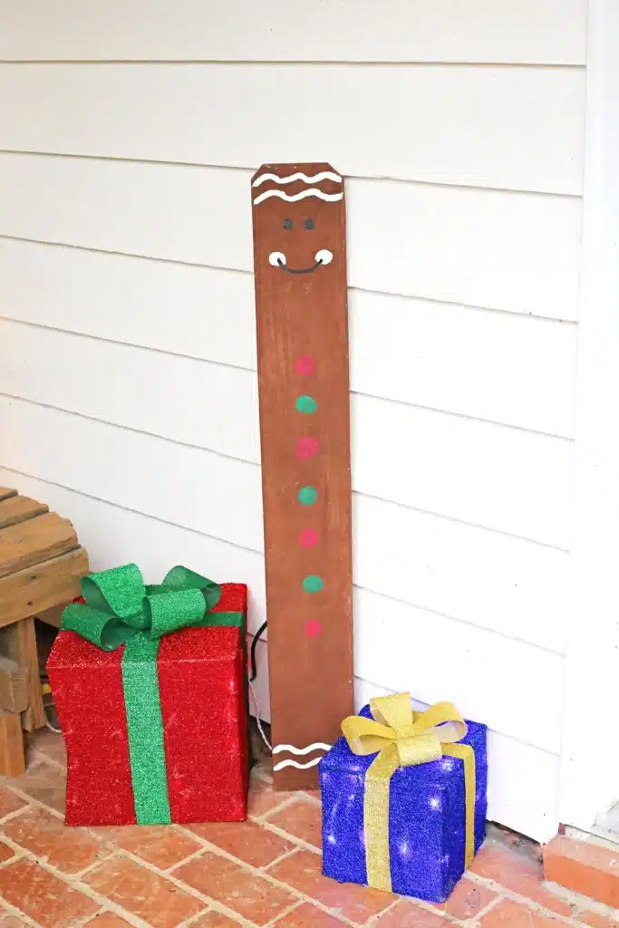 Wooden Gingerbread Keepsake Craft - Cultivating Brilliant Minds Wooden Gingerbread Keepsake Craft: a wooden board cut to the height of a child and painted to look like a gingerbread man
