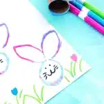 Bunny Stamp Art with Toilet Paper Rolls - Cultivating Brilliant Minds bunny stamp art on a piece of paper using a toilet paper roll
