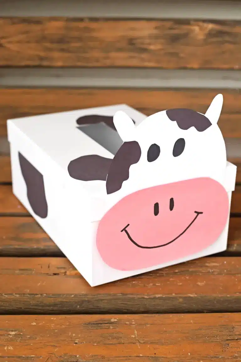 a box decorated to look like a cow for a cow valentine box