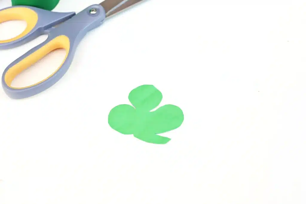 St. Patrick's Day Rainbow Toilet Paper Roll Streamer - Cultivating Brilliant Minds a shamrock cut out of green construction paper