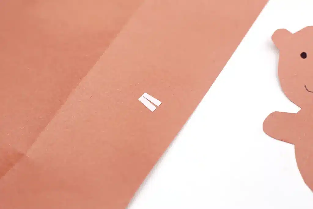 Groundhog Day Craft For Kids - Cultivating Brilliant Minds two small strips cut out of white paper for the groundhog's teeth