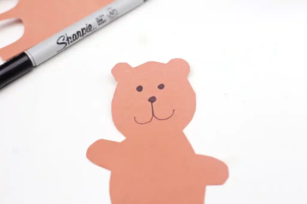 Groundhog Day Craft For Kids - Cultivating Brilliant Minds a groundhog cut out of brown construction paper with a face drawn on with a black marker
