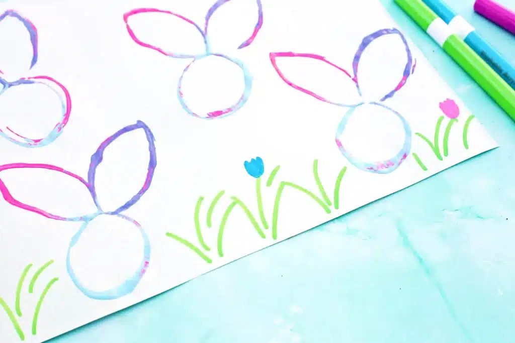 Bunny Stamp Art with Toilet Paper Rolls - Cultivating Brilliant Minds bunny stamp art on a piece of paper using a toilet paper roll