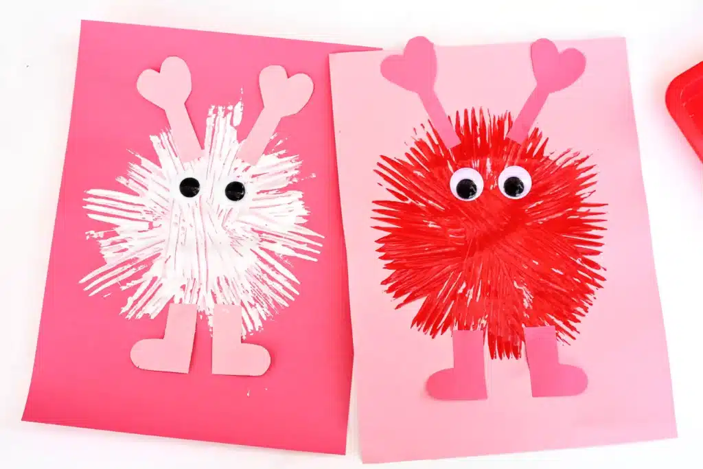 Fork Painted Love Monsters - Cultivating Brilliant Minds love monsters painted with a fork on construction paper