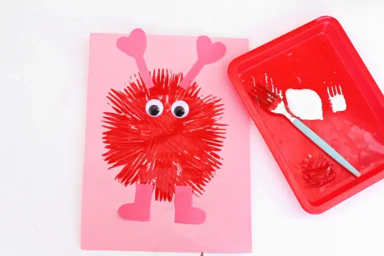 love monsters painted with a fork on construction paper