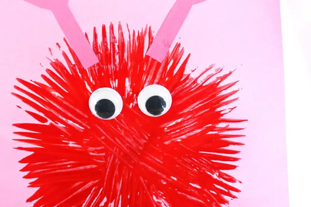 Fork Painted Love Monsters - Cultivating Brilliant Minds love monsters painted with a fork on construction paper