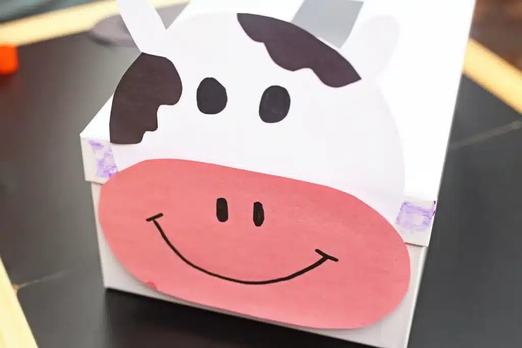 Cow Valentine Box - Cultivating Brilliant Minds a box decorated to look like a cow for a cow valentine box