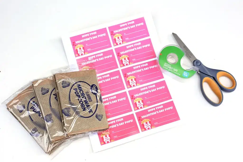 Printable Valentines - Cultivating Brilliant Minds printable valentine that reads "I hope you valentine's day pops!" next to bags of microwave popcorn.