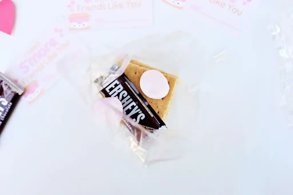 Printable Valentines I need s'more friends like you - Cultivating Brilliant Minds a bag filled with graham crackers, chocolate, and a marshmallow