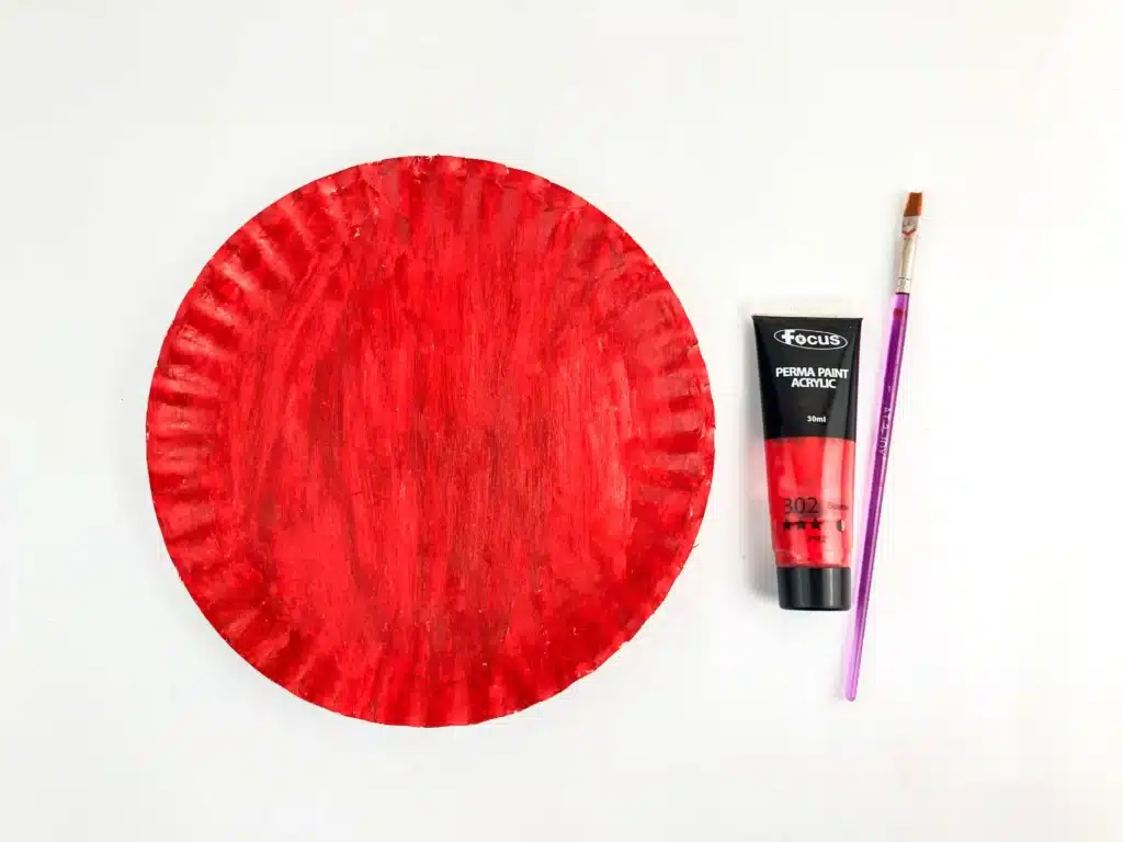 Valentine Monkey Craft - Cultivating Brilliant Minds a paper plate painted red