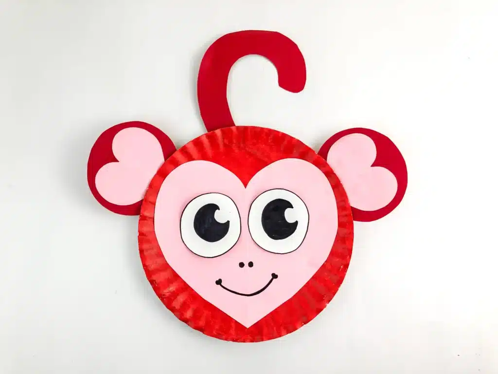 Valentine Monkey Craft - Cultivating Brilliant Minds A paper plate decorated to look like a red and pink monkey for valentine's day