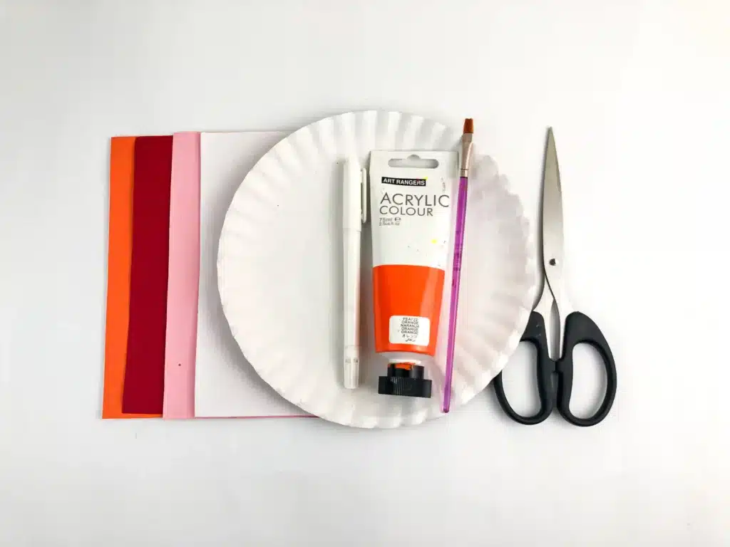 Valentine's Day Cat Craft - Cultivating Brilliant Minds colored construction paper, paper plate, orange paint, a paintbrush, and scissors.