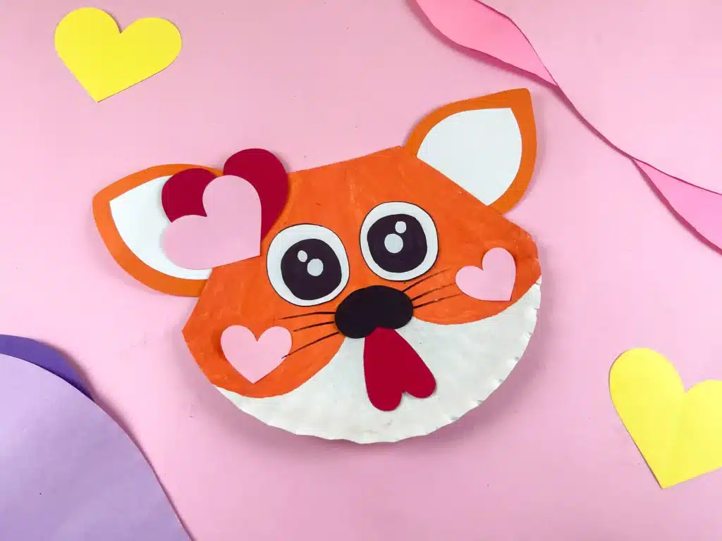 Valentine's Day Cat Craft - Cultivating Brilliant Minds a paper plate painted and decorated to look like a cat for valentine's day