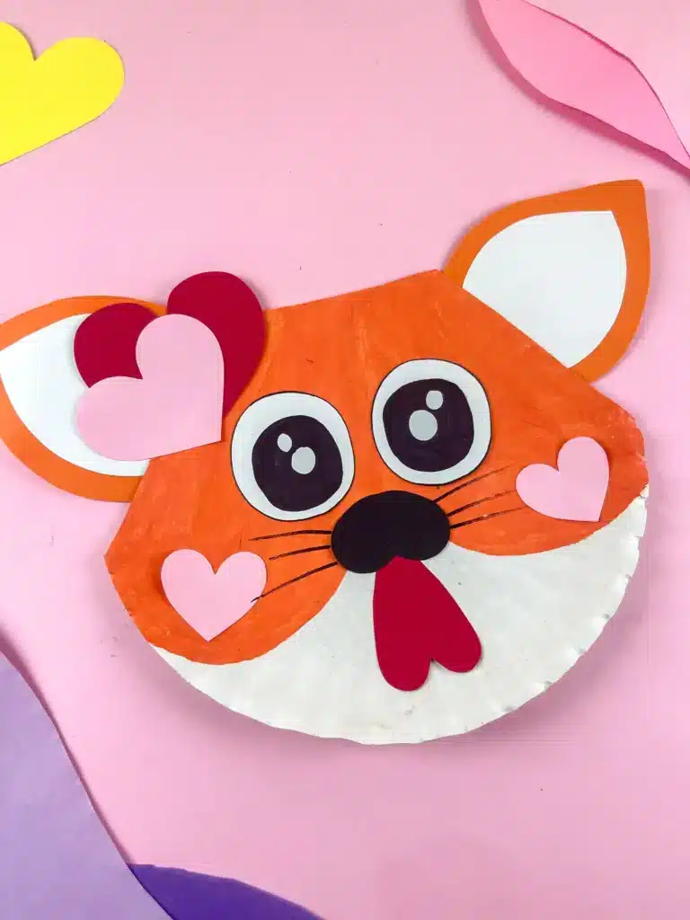 Valentine's Day Cat Craft - Cultivating Brilliant Minds a paper plate painted and decorated to look like a cat for valentine's day