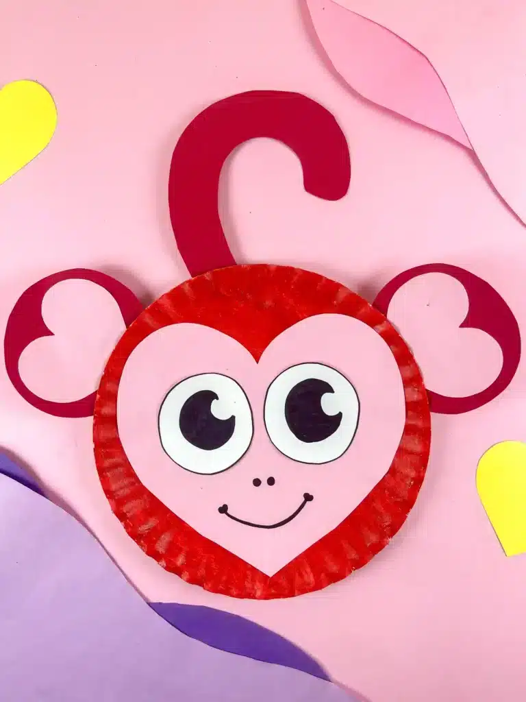 Valentine Monkey Craft - Cultivating Brilliant Minds A paper plate decorated to look like a red and pink monkey for valentine's day