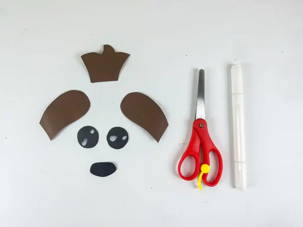 Sloth Valentine Box - Cultivating Brilliant Minds sloth face cut out of construction paper