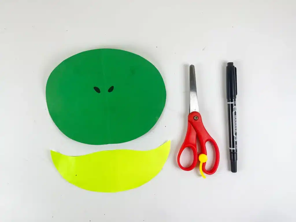 Frog Valentine Box - Cultivating Brilliant Minds frog face cut out of green construction paper