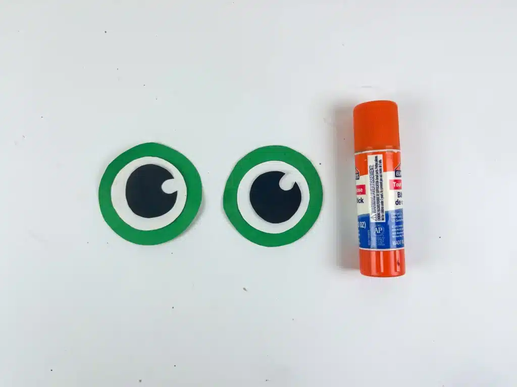 Frog Valentine Box - Cultivating Brilliant Minds frog eyes made out of green, white, and black construction paper