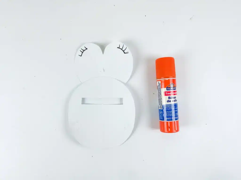 Penguin Valentine Box - Cultivating Brilliant Minds white construction paper cut to look like a penguin's belly