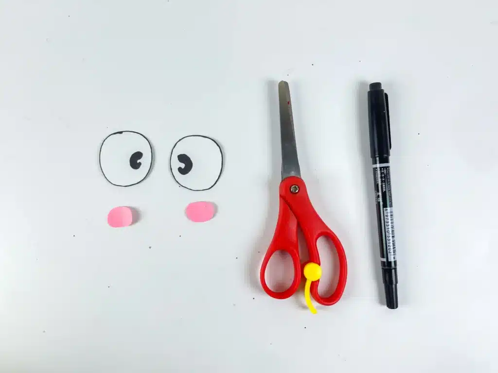 Bee Valentines Box - Cultivating Brilliant Minds eyes and rosy cheeks cut out of construction paper