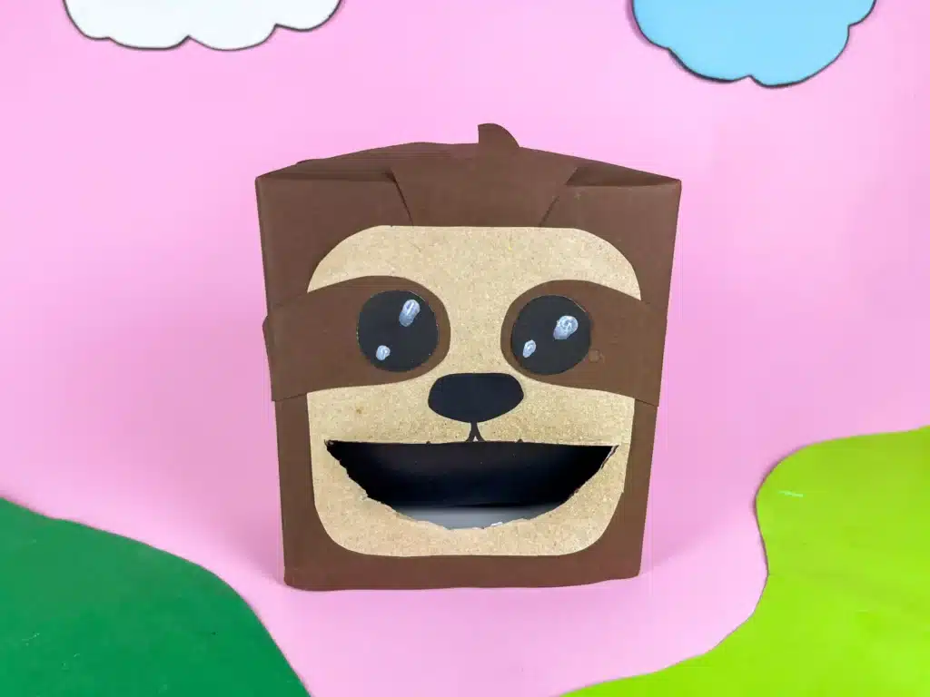 Sloth Valentine Box - Cultivating Brilliant Minds a sloth valentine box covered in brown paper and construction paper to look like a sloth