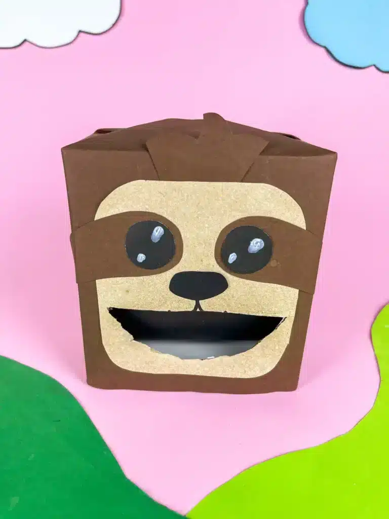 Sloth Valentine Box - Cultivating Brilliant Minds a sloth valentine box covered in brown paper and construction paper to look like a sloth