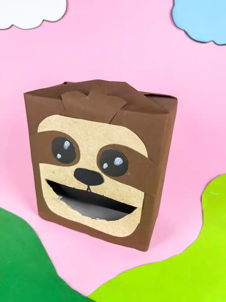 Sloth Valentine Box - Cultivating Brilliant Minds a sloth valentine box covered in brown paper and construction paper to look like a sloth
