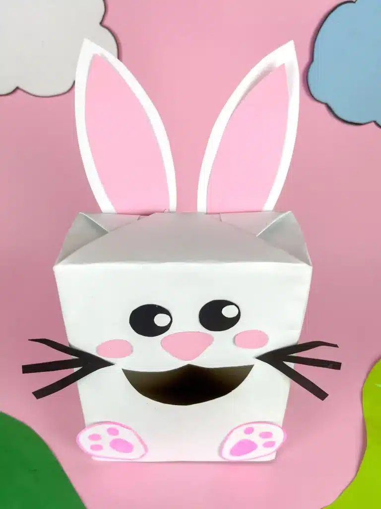 Bunny Valentines Box - Cultivating Brilliant Minds a bunny valentines box that has a box covered in white paper and a construction paper face, ears, and feet to look like a bunny