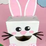 Bunny Valentines Box - Cultivating Brilliant Minds a bunny valentines box that has a box covered in white paper and a construction paper face, ears, and feet to look like a bunny