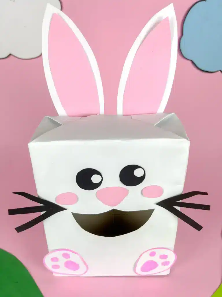 Bunny Valentines Box - Cultivating Brilliant Minds a bunny valentines box that has a box covered in white paper and a construction paper face, ears, and feet to look like a bunny