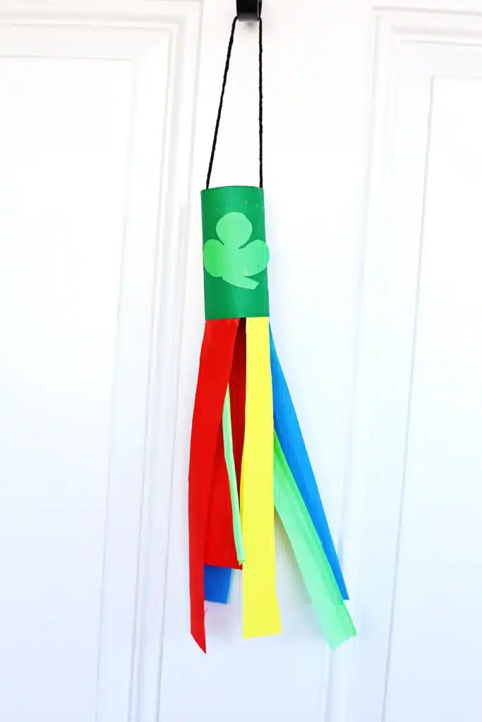 St. Patrick's Day Rainbow Toilet Paper Roll Streamer - Cultivating Brilliant Minds St. Patrick's Day Rainbow Toilet Paper Roll Streamer - a toilet paper roll painted green attached to different colored streamers