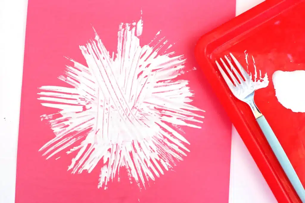 Fork Painted Love Monsters - Cultivating Brilliant Minds a big blob painted with a fork on construction paper